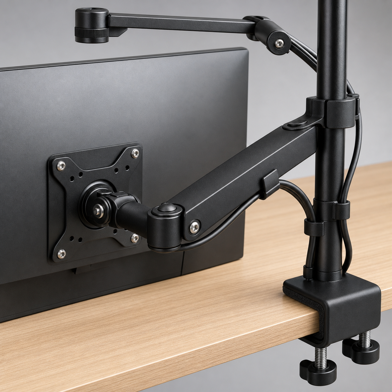 Monitor arm VESA plate and desk clamp detail
